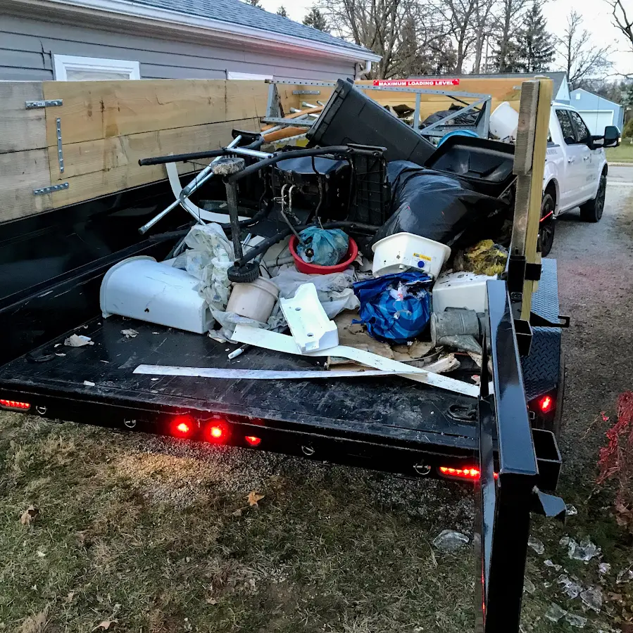 Roll-off dumpster delivered to a residential driveway in Milbank